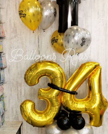 birthday arrangement with tuxedo balloon