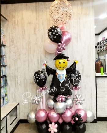graduation arrangement of chrome and confetti balloons