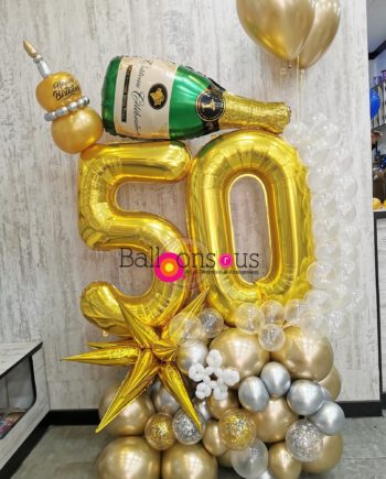 BIRHDAY ARRANGEMENT WITH CHAMPAGNE BOTTEL