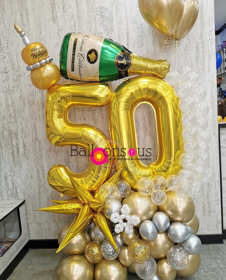 BIRHDAY ARRANGEMENT WITH CHAMPAGNE BOTTEL