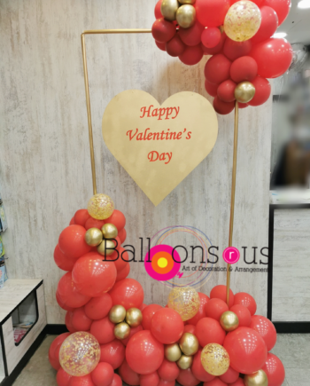 Stand of balloons with wood heart frame