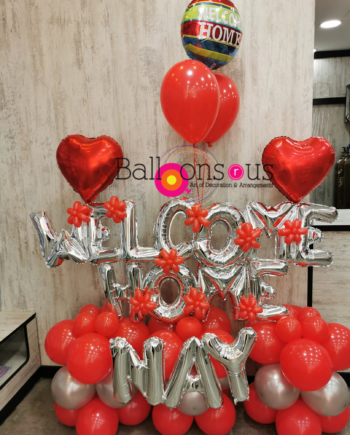 Welcome Home with heart balloons