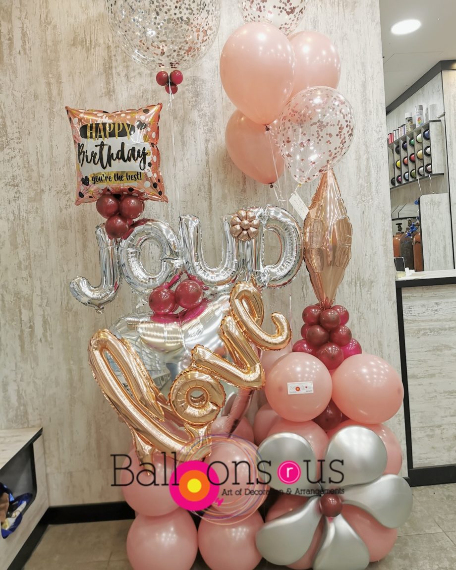 happy birthday arrangement with confetti balloons