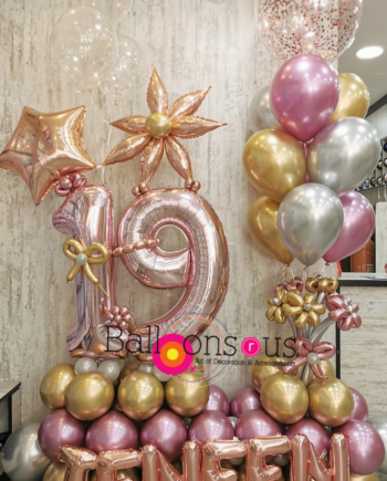 luxury birthday arrangement with chrome and confetti balloons