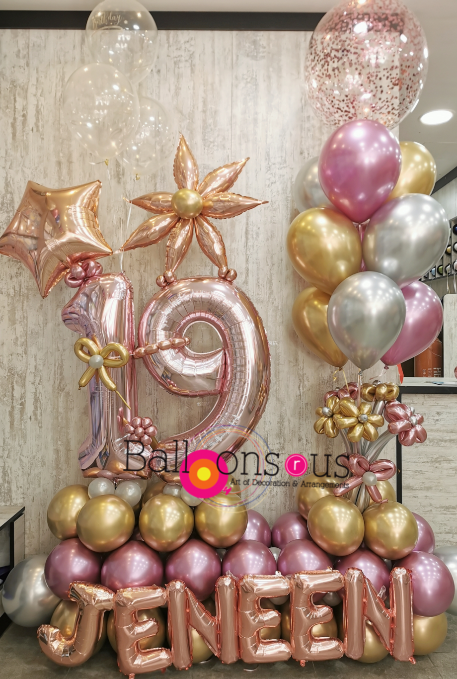 luxury birthday arrangement with chrome and confetti balloons