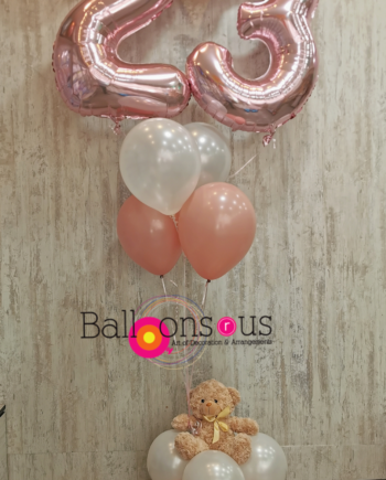 arrangement with teddy bear