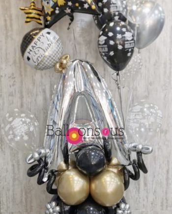 graduation arrangement with big letter